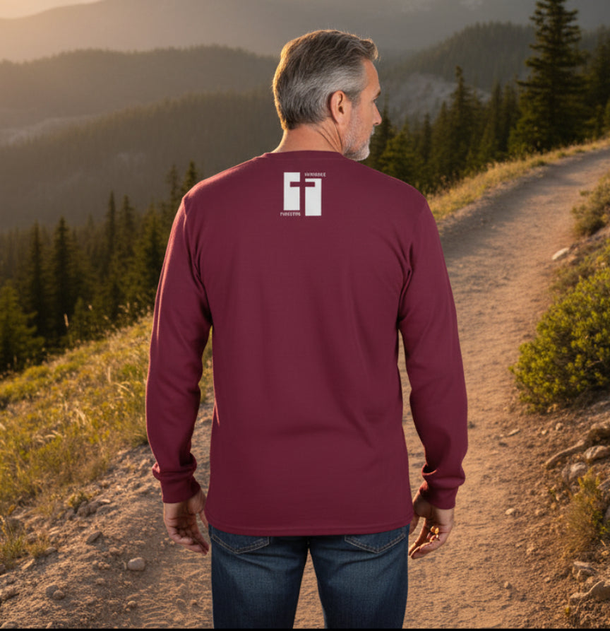 Maroon long-sleeve shirt with a white cross design on the back against a gray background