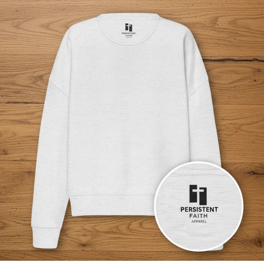 White sweatshirt with 'Persistent Faith Apparel' logo on a white background