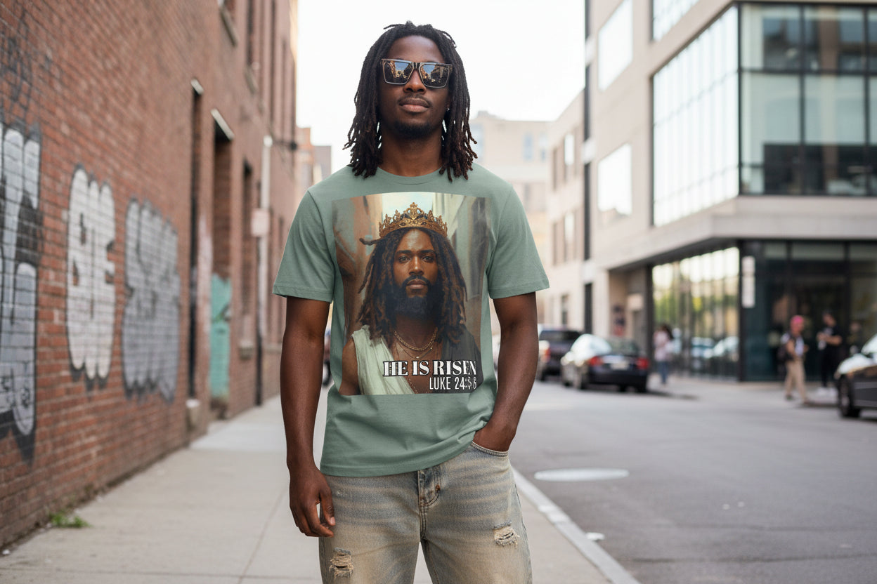 T-shirt with a graphic of a Black Jesus with a crown and 'He is Risen' text 
