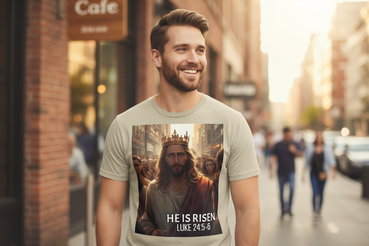 Man wearing a t-shirt with a crowned White Jesus with text He is Risen on a city street