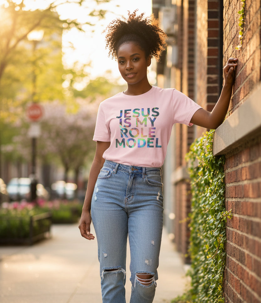 Pink t-shirt with 'Jesus is my role model' text on a white background