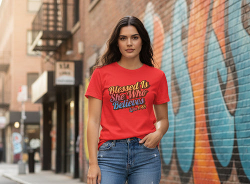Woman wearing a red t-shirt with a graphic design and text on a white background