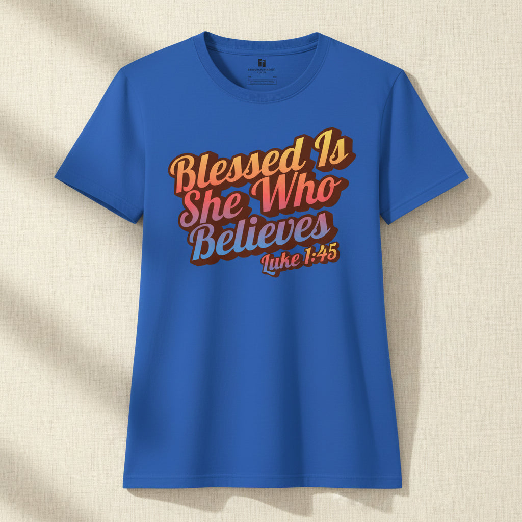 Blue t-shirt with 'Blessed is She Who Believes' text on a white background