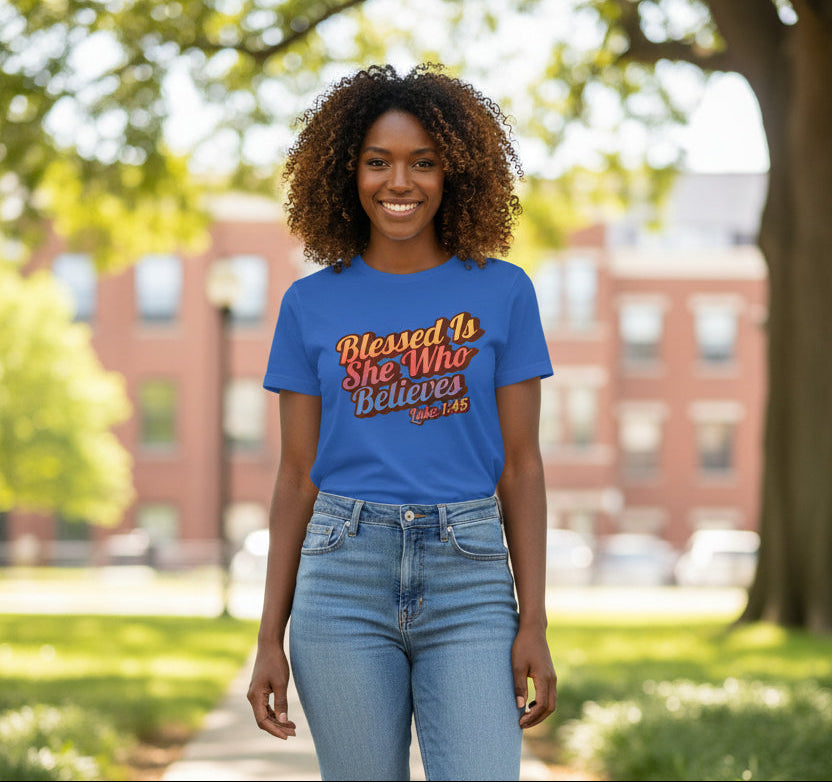 Woman wearing a blue t-shirt with text on a white background