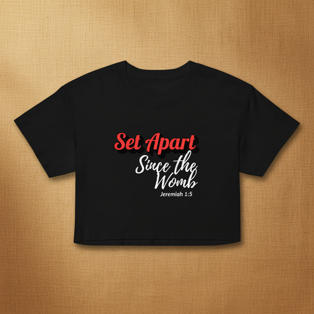 Black crop top with red and white text on a white background