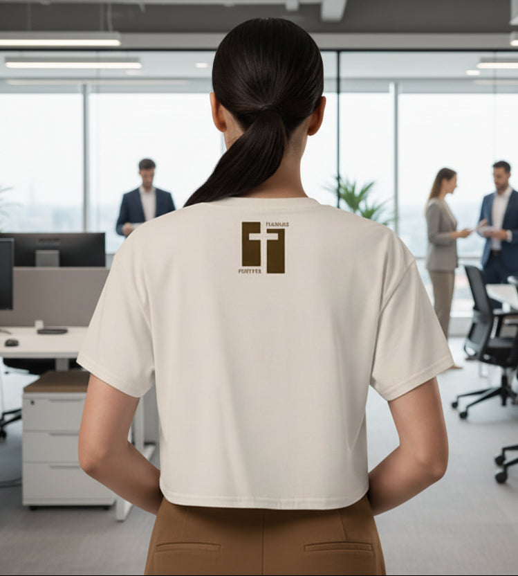 Bone cropped t-shirt with a brown cross design on the back against a white background