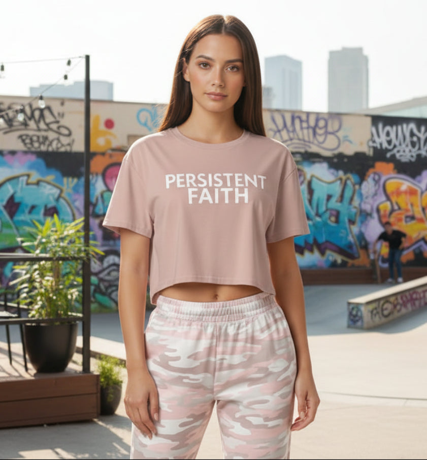 Hazy pink crop top with 'Persistent Faith' text on a white background