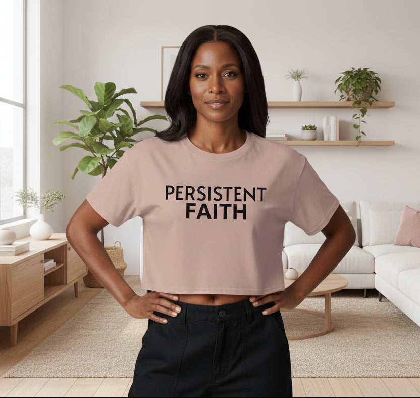 Hazy pink crop top with 'PERSISTENT FAITH' in black text on a white background