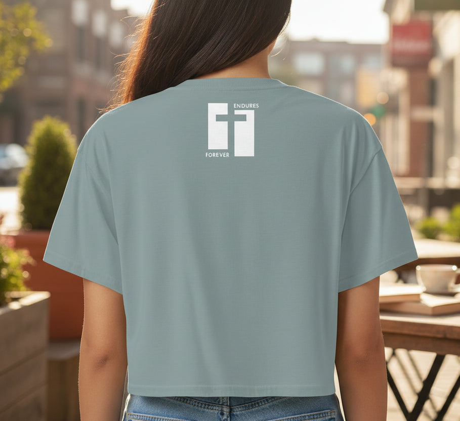 MINERAL GREEN CROPPED t-shirt with a logo on the back against a white background