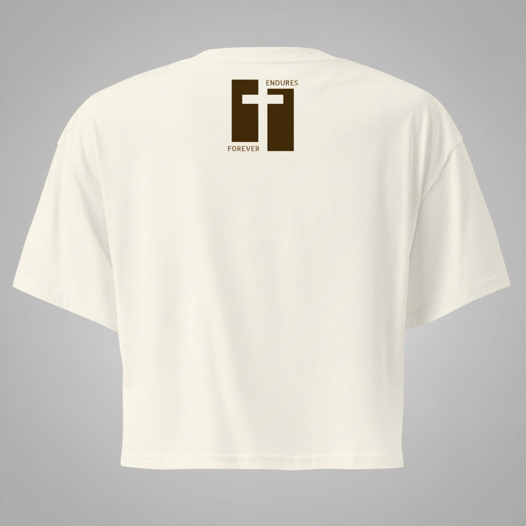 Natural cropped t-shirt with a brown cross design and text on the back against a white background