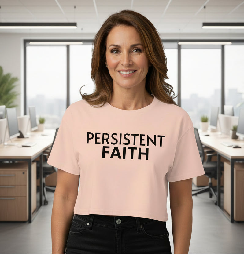 Pale Pink crop top with 'PERSISTENT FAITH' black text on a gray background