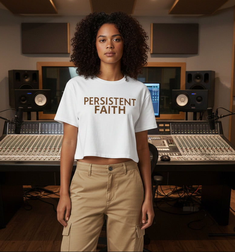 White crop top with 'PERSISTENT FAITH' text in brown on a white background
